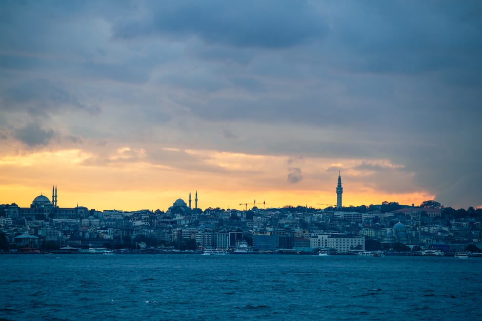 Captivating sunset view of Istanbul's skyline showcasing iconic landmarks and the Bosphorus.